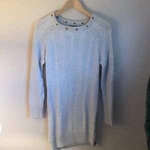 Cream cable knit sweater dress with brass studded neckline detail and side zip